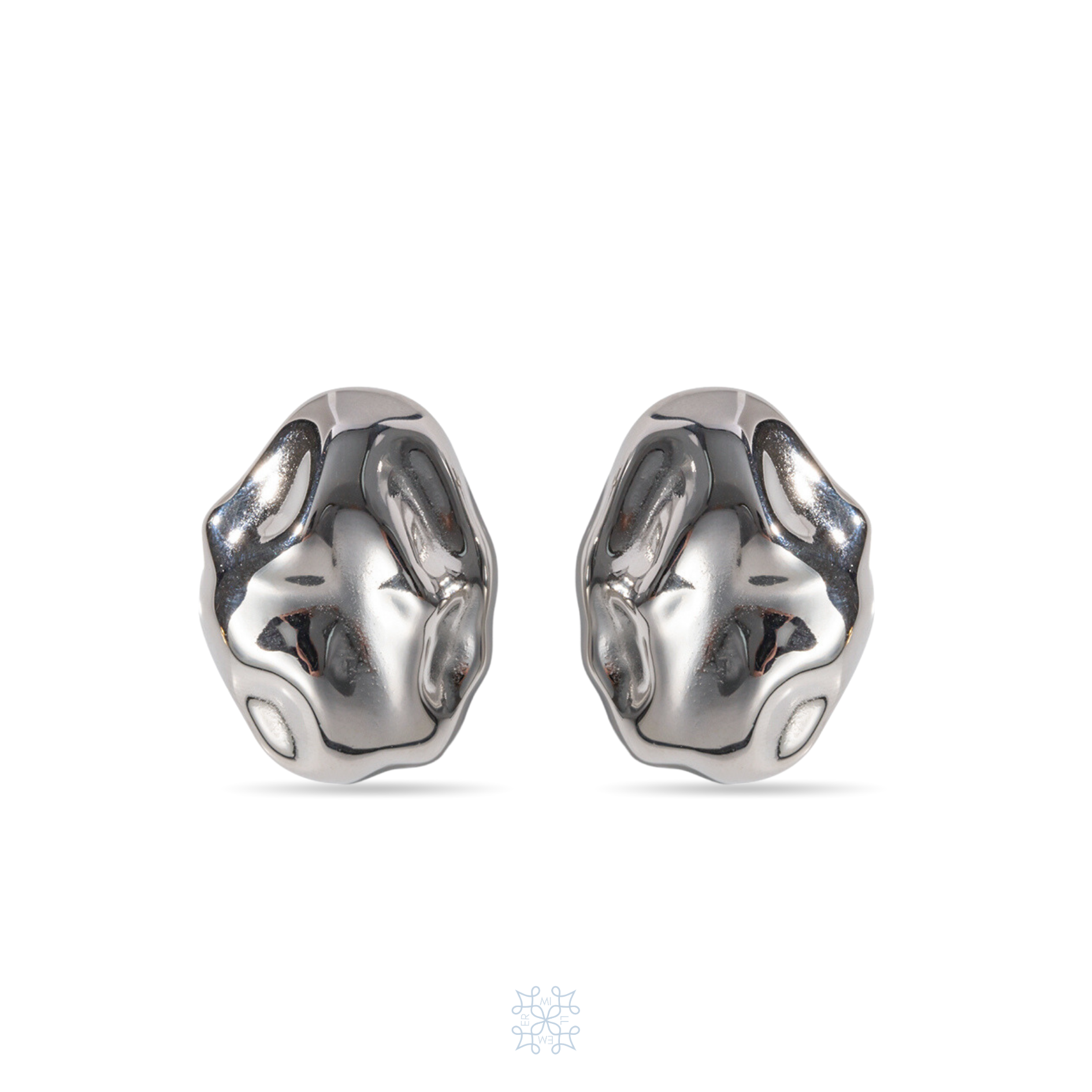 Silver Oval Earring with an irregualr surface resembling an hammered metal with the shape of an oval rock. Silver Plated. Pebble Silver Earrings