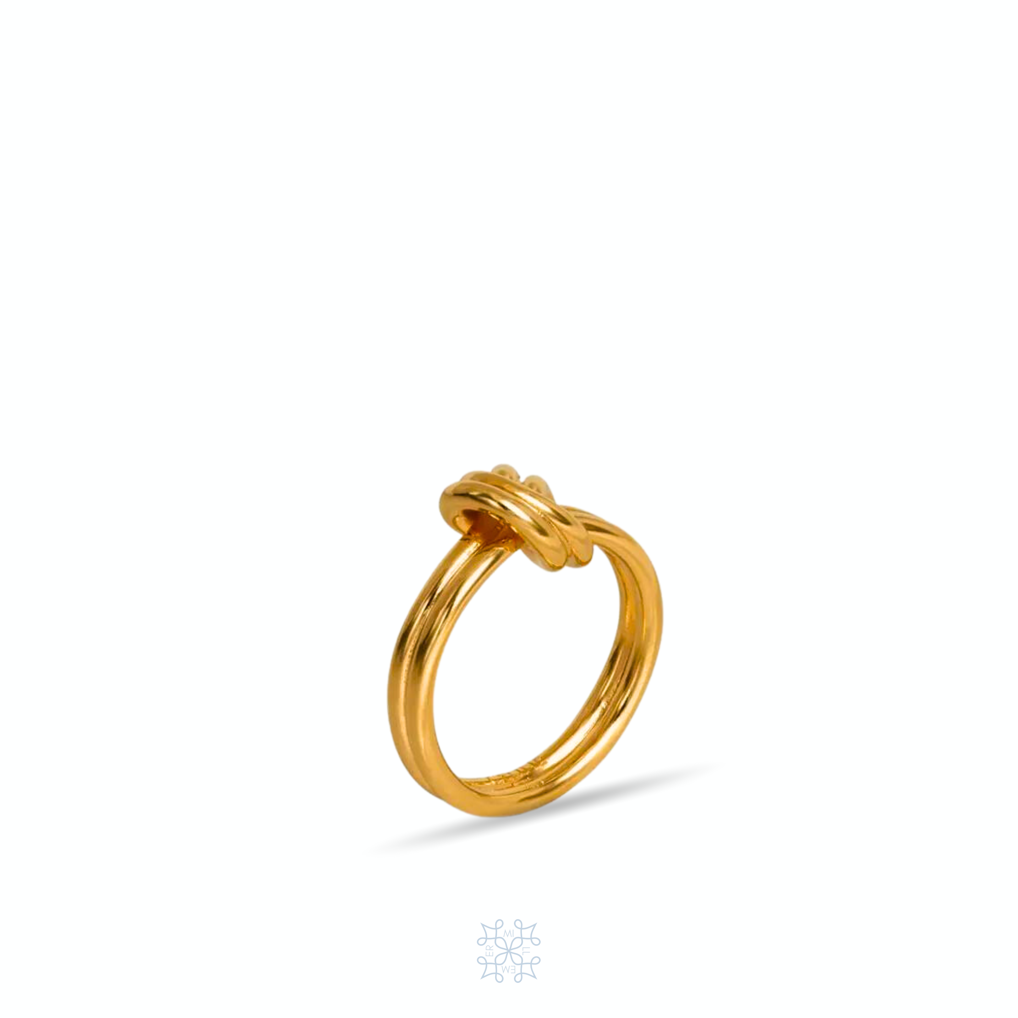 Gold plated ring with the shape of a knot on the top of it. Knot Gold Ring