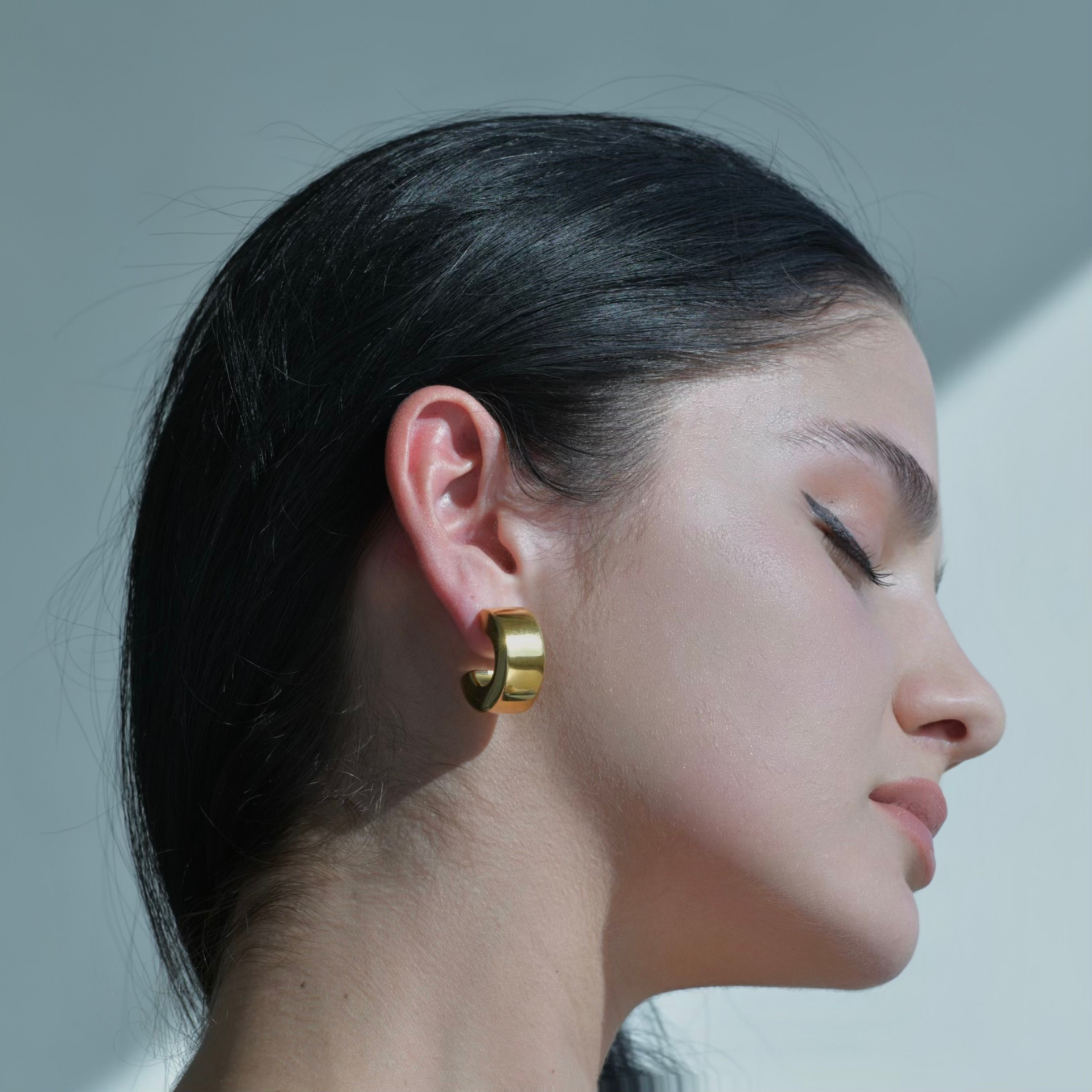  Geometric Gold Hoop Earrings. in the form of a bold geometric hoop.