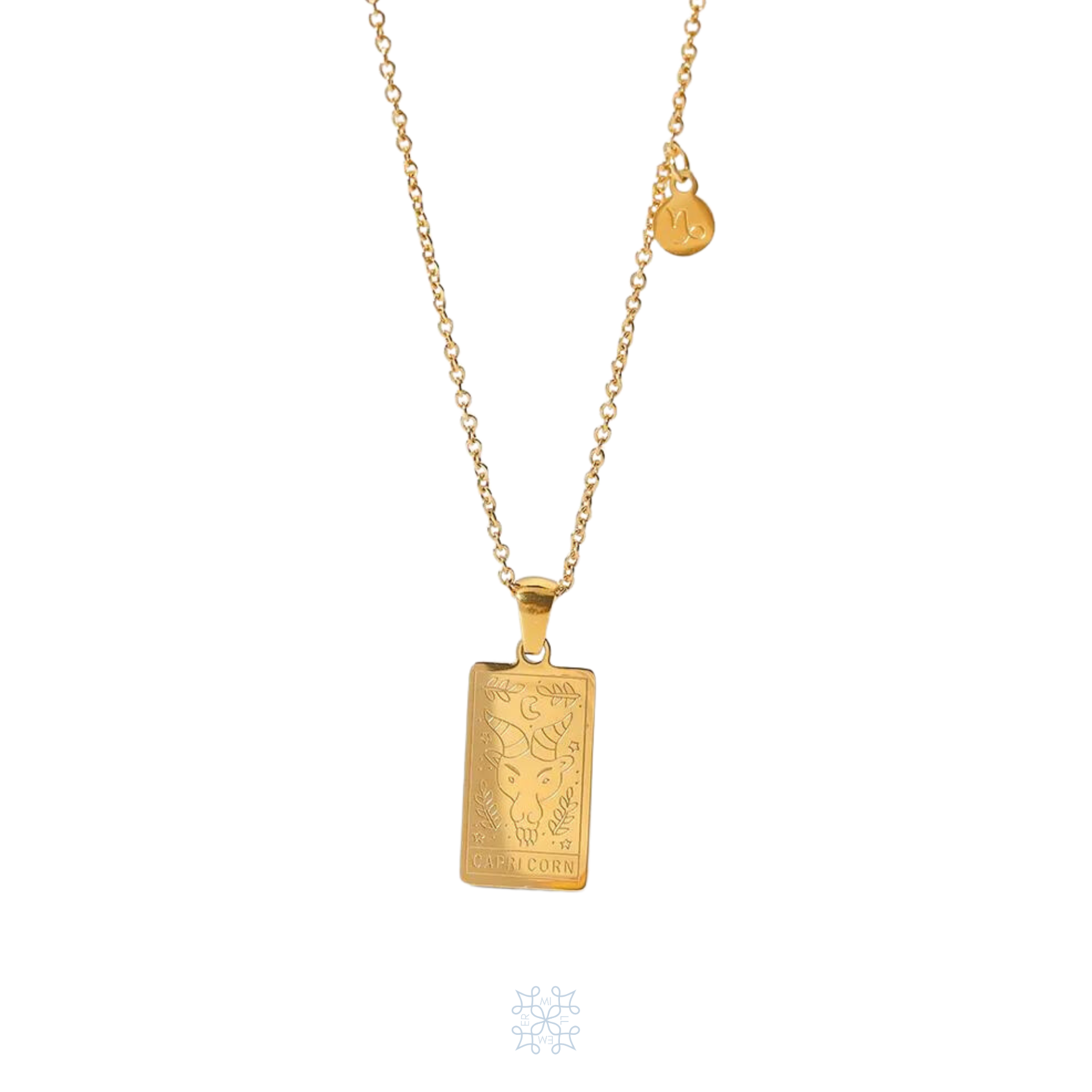 CAPRICORN Zodiac Pendant Gold Necklace. rectangular gold pendant. gold chain. the zodiacal sign of the goat with the goat's head is engraved on the pendant and the word capricorn is engraved on the bottom. at the side of the pendant attached on the chain is a small medallion with the capricorn symbol engraved on it.
