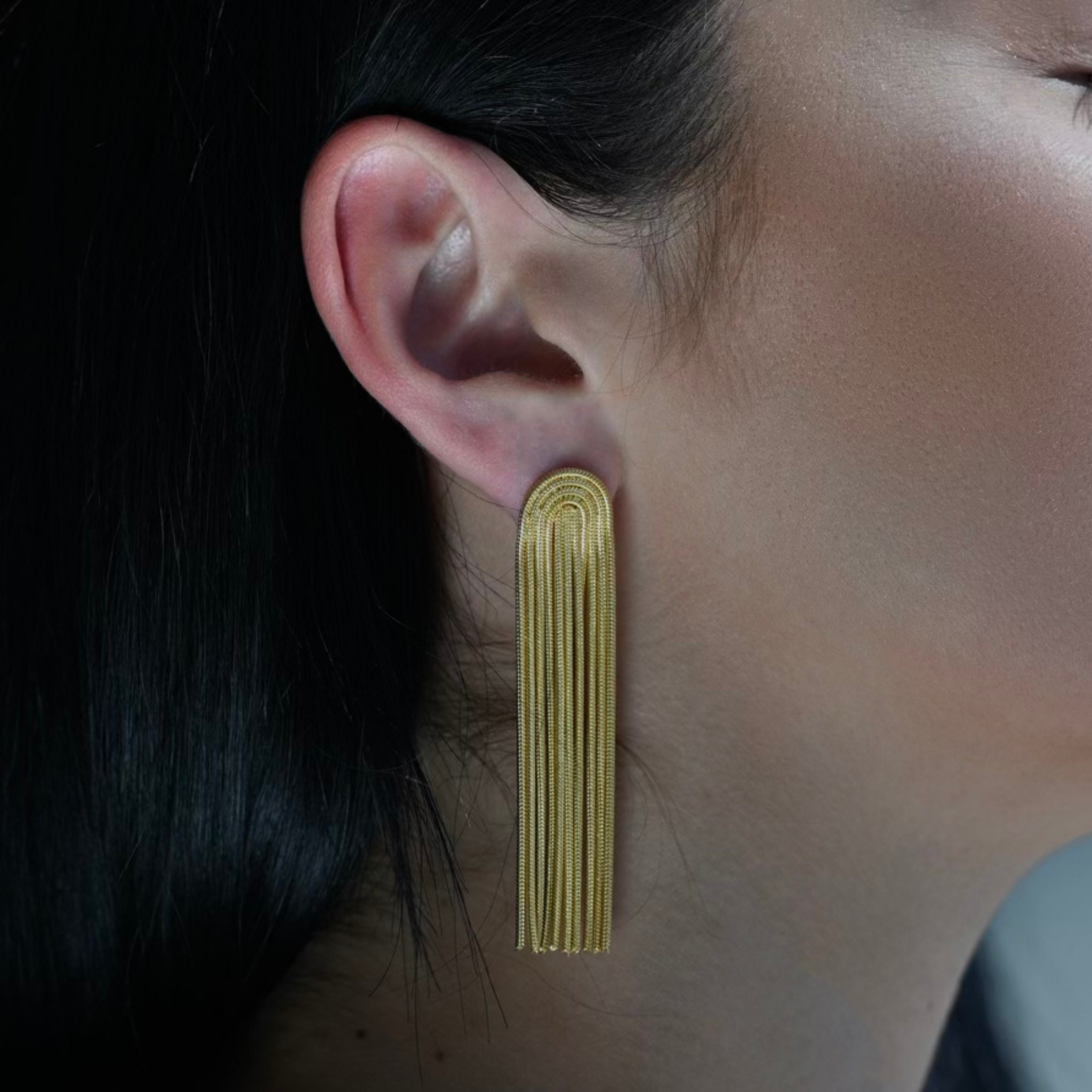 CLEO Gold Drop Earrings. Rustic look with 11 rope lookalike chains droping forming a U half square shape in the post top part of the earrings.