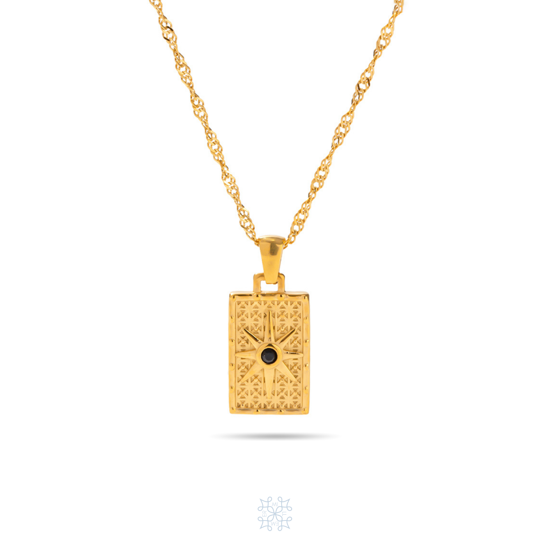 Rectangular compass Gold pendant. A star engraved in the top of the pendant with a black zircon in the middle. th ependant has the same design in both sides of ot. It has a long gold chain.