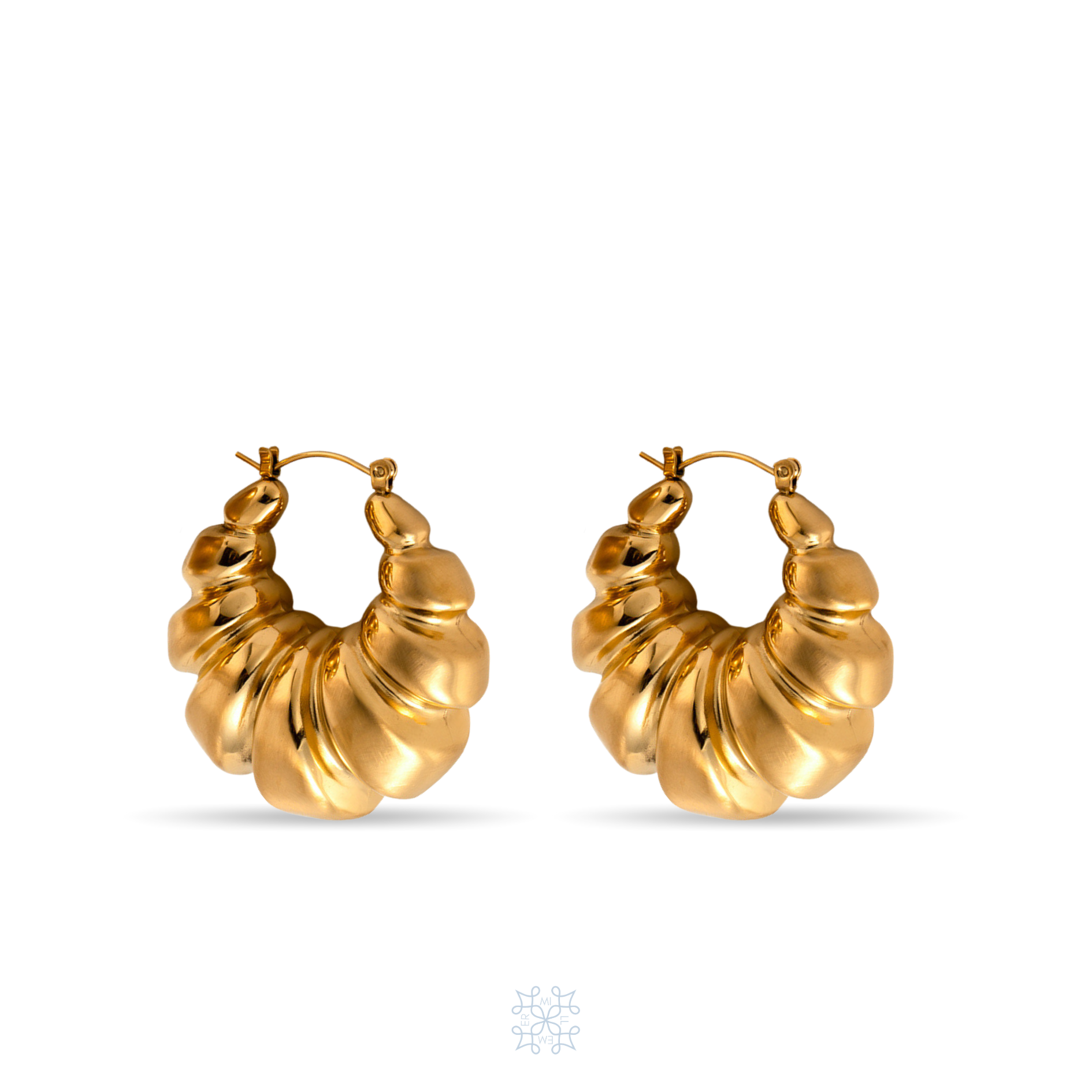 Croissant shaped chunky gold hoop earrings.