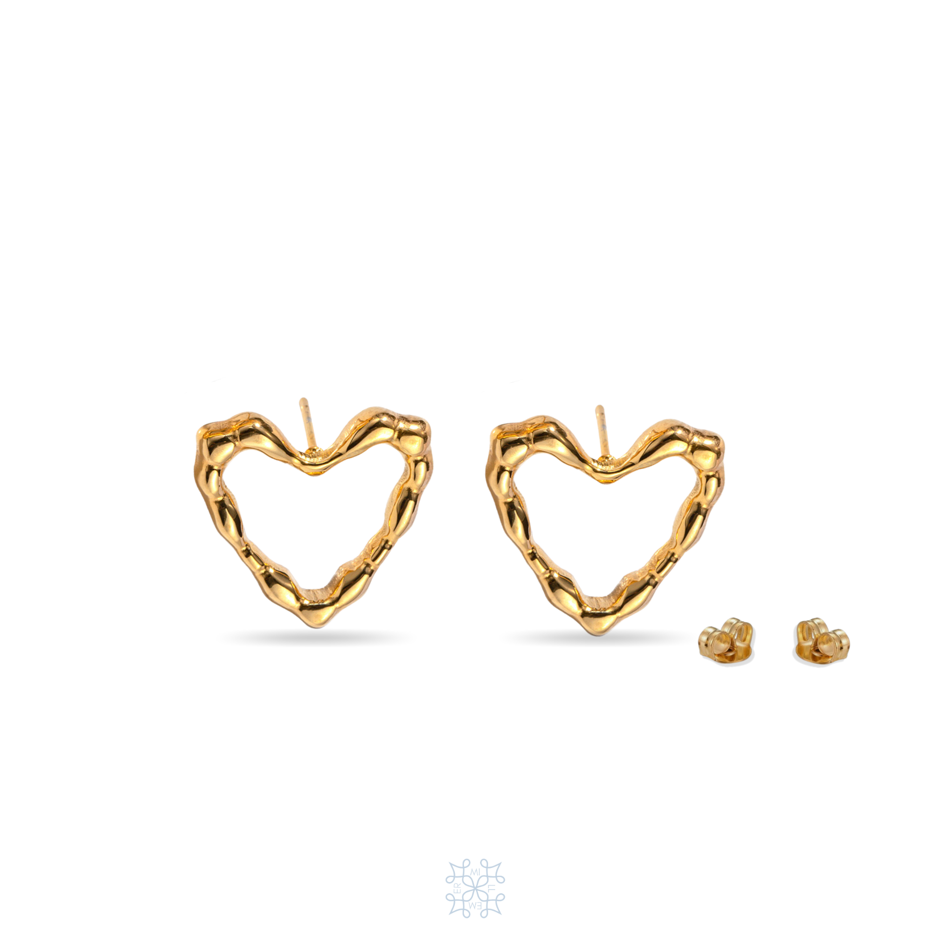 Heart shape gold stud earrings. Irregular surface on the border of the heart shape. the base of the earrings is empty the heart shape is the borders of the design.