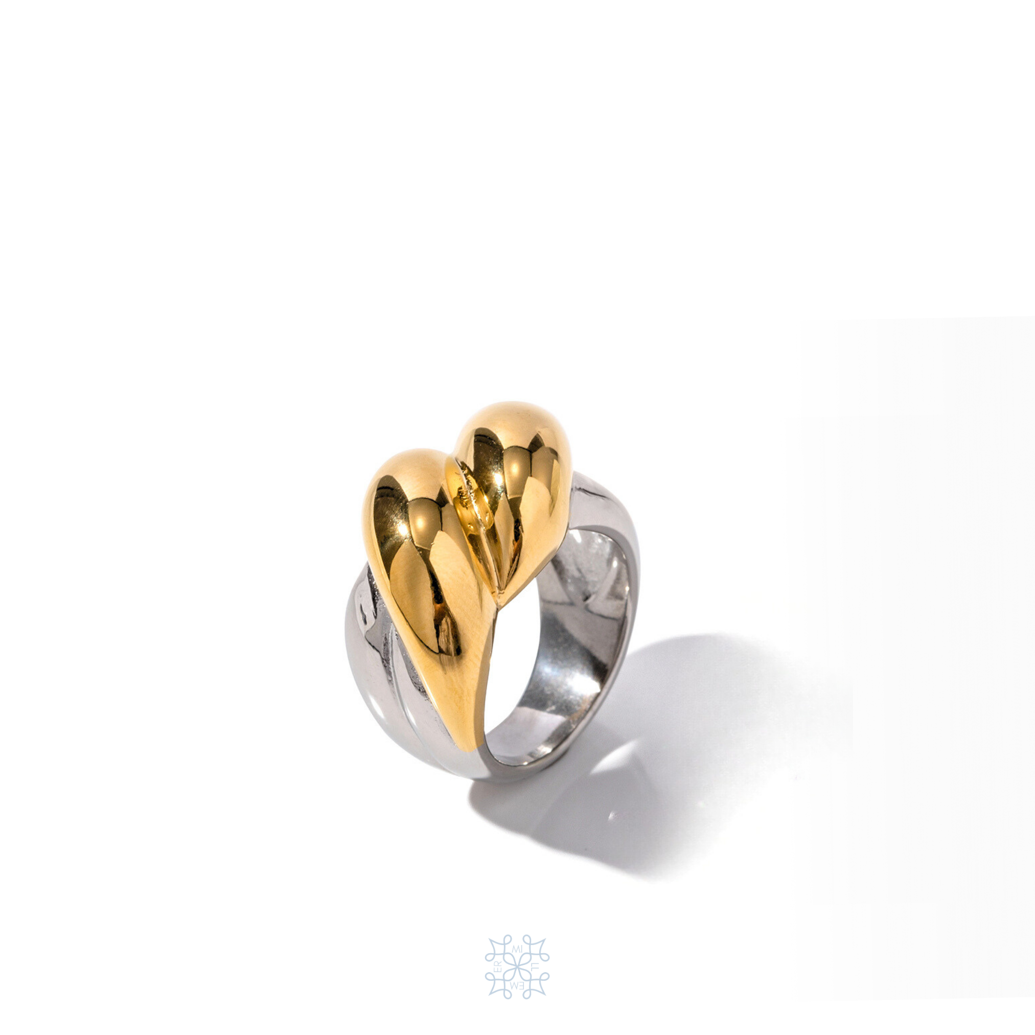 Bold chunky silver and gold ring. Twisted gold part on the top of the ring.