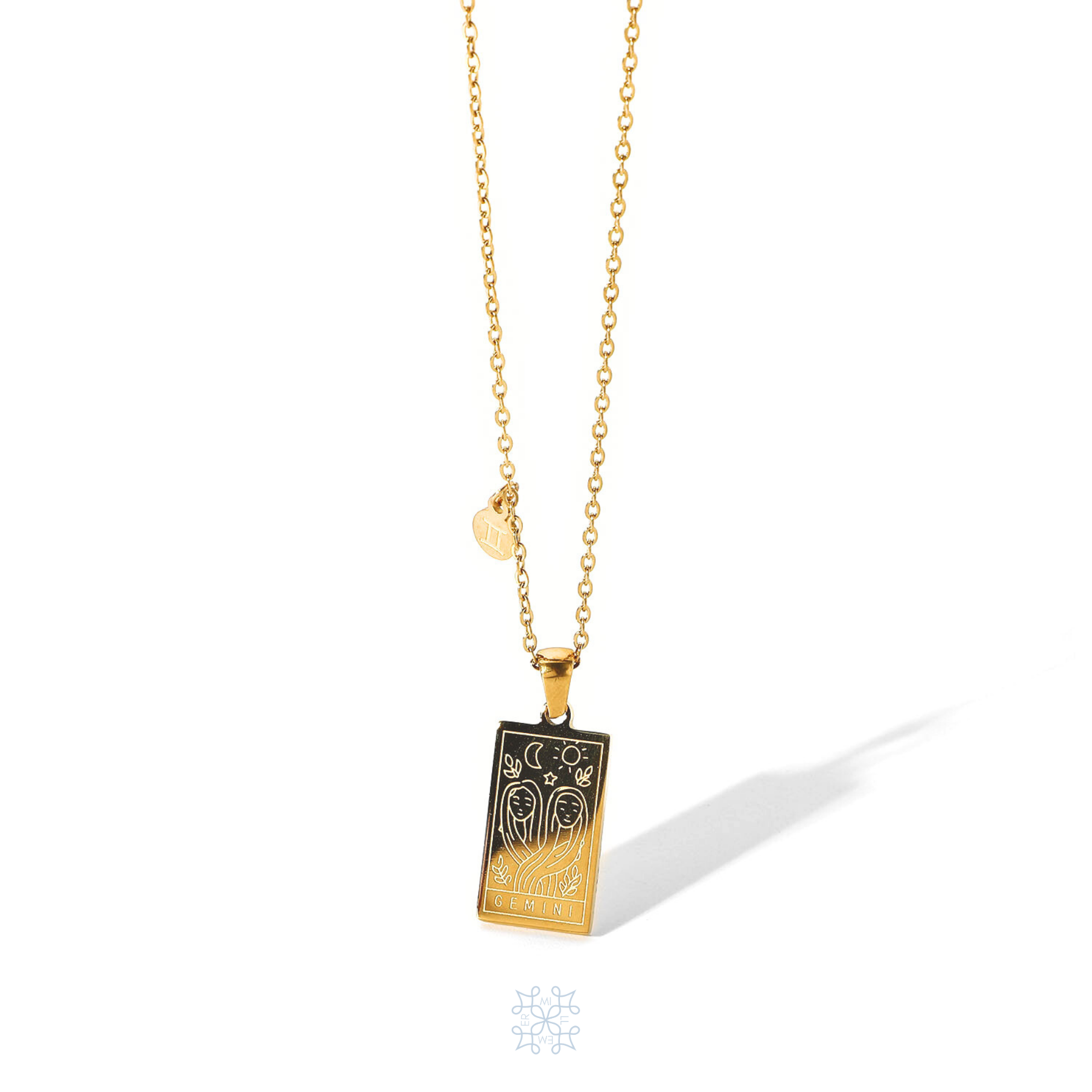 GEMINI Zodiac Pendant Gold Necklace - Gold chain necklace with gemini engraved in a  vertical rectangular  shape pendant. at the bottom of the pendant is engraved the word "gemini". on the side of the pendant at the chain is attched a square charm with gemini symbol engraved on it.