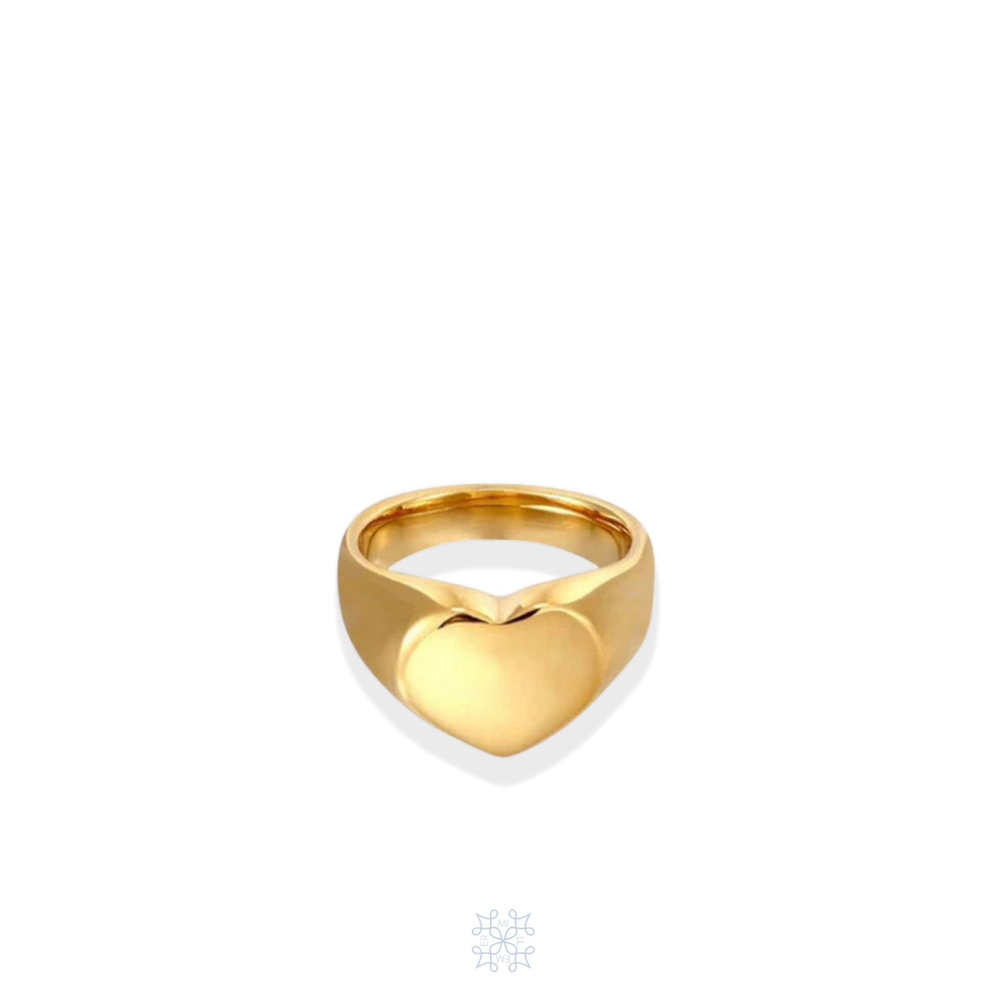 Gold Ring with heart shape in the centre. 
