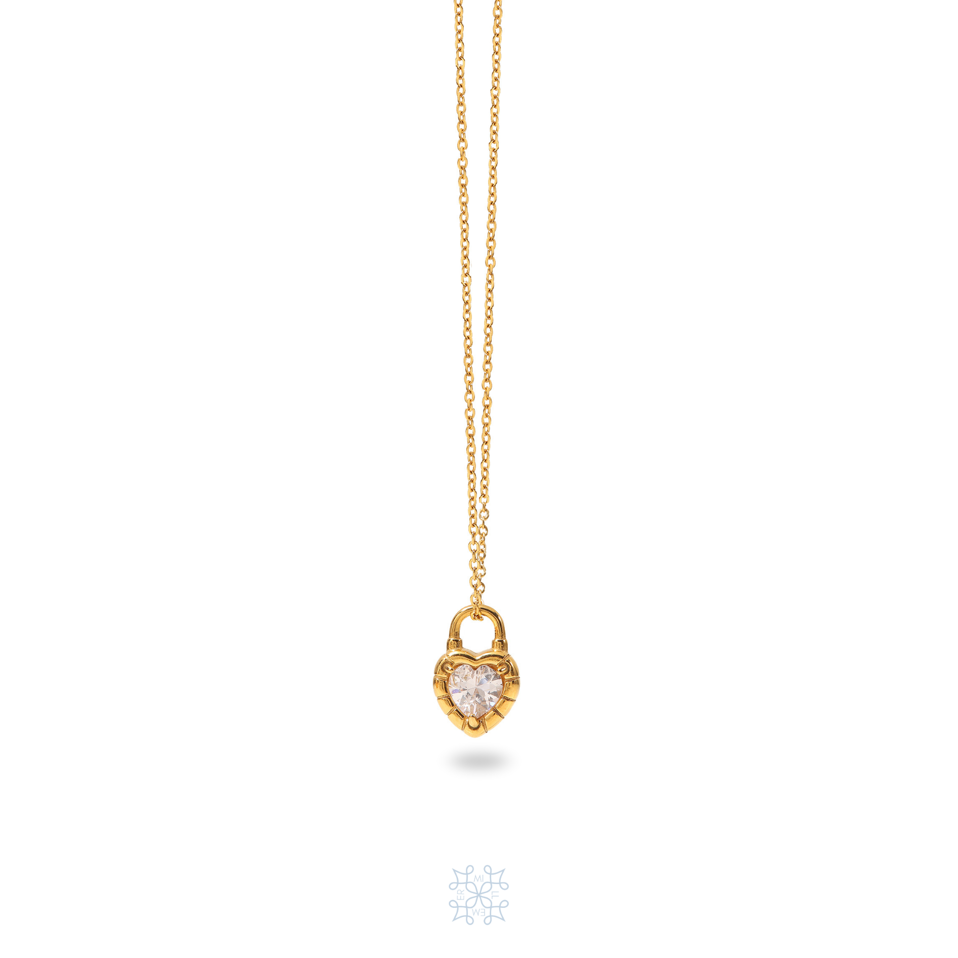 HEARTLOCK Zircon Pendant Gold Necklace. Gold chain with a locker pendnat in the form of a heart. In the middle of the gold heart pendnat is a white zircon stone.