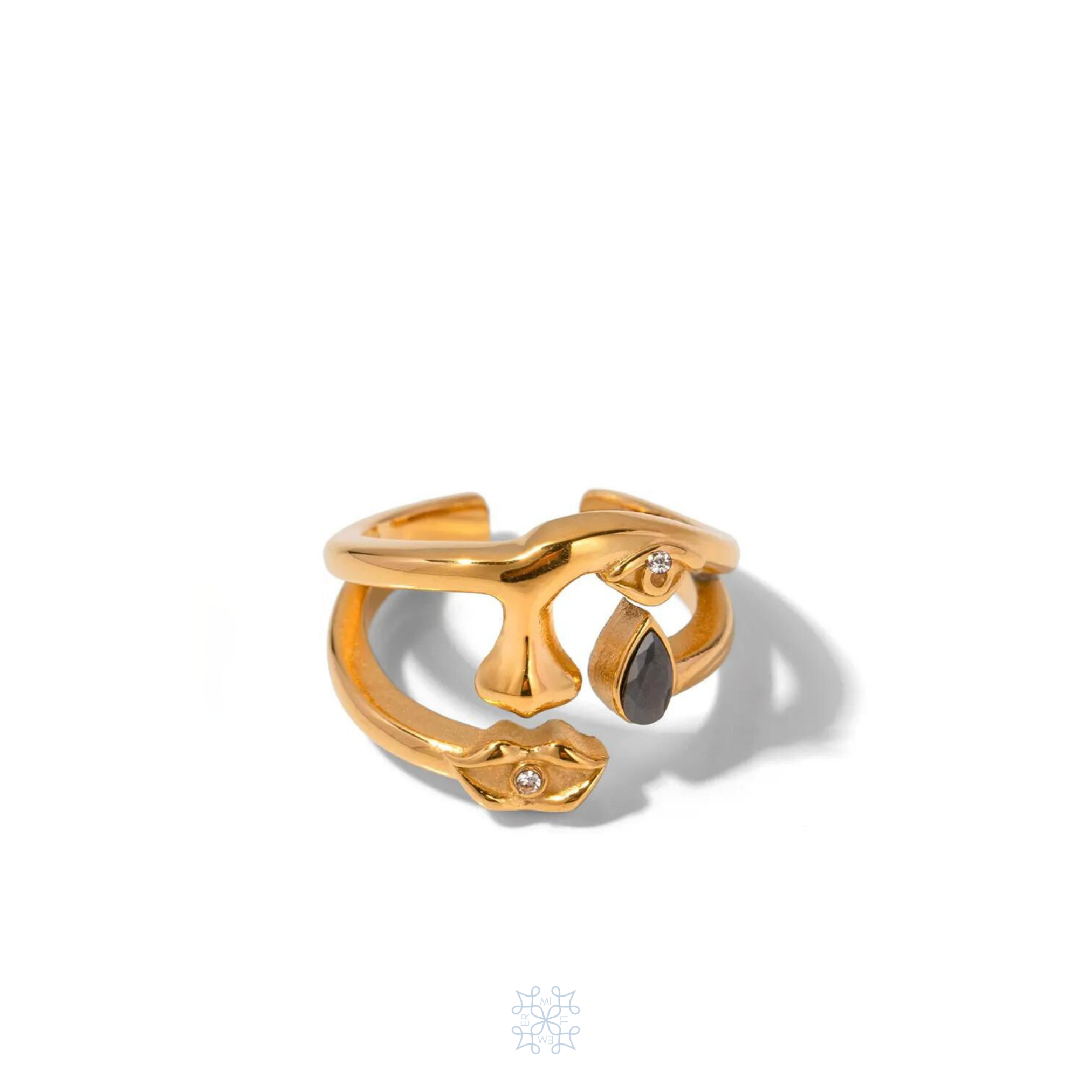 Her face gold zircon ring. Surreal gold ring with the shape of a face , eyes, noes, lips and a teardrop with a black zircon attached on the drop. In the lip and eye it has a small white zircon