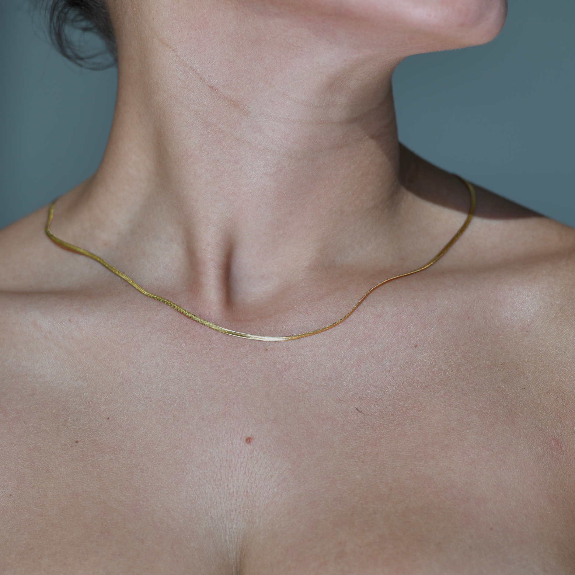 Herringbone necklace texture, two milimetres slim, gold, chain necklace.