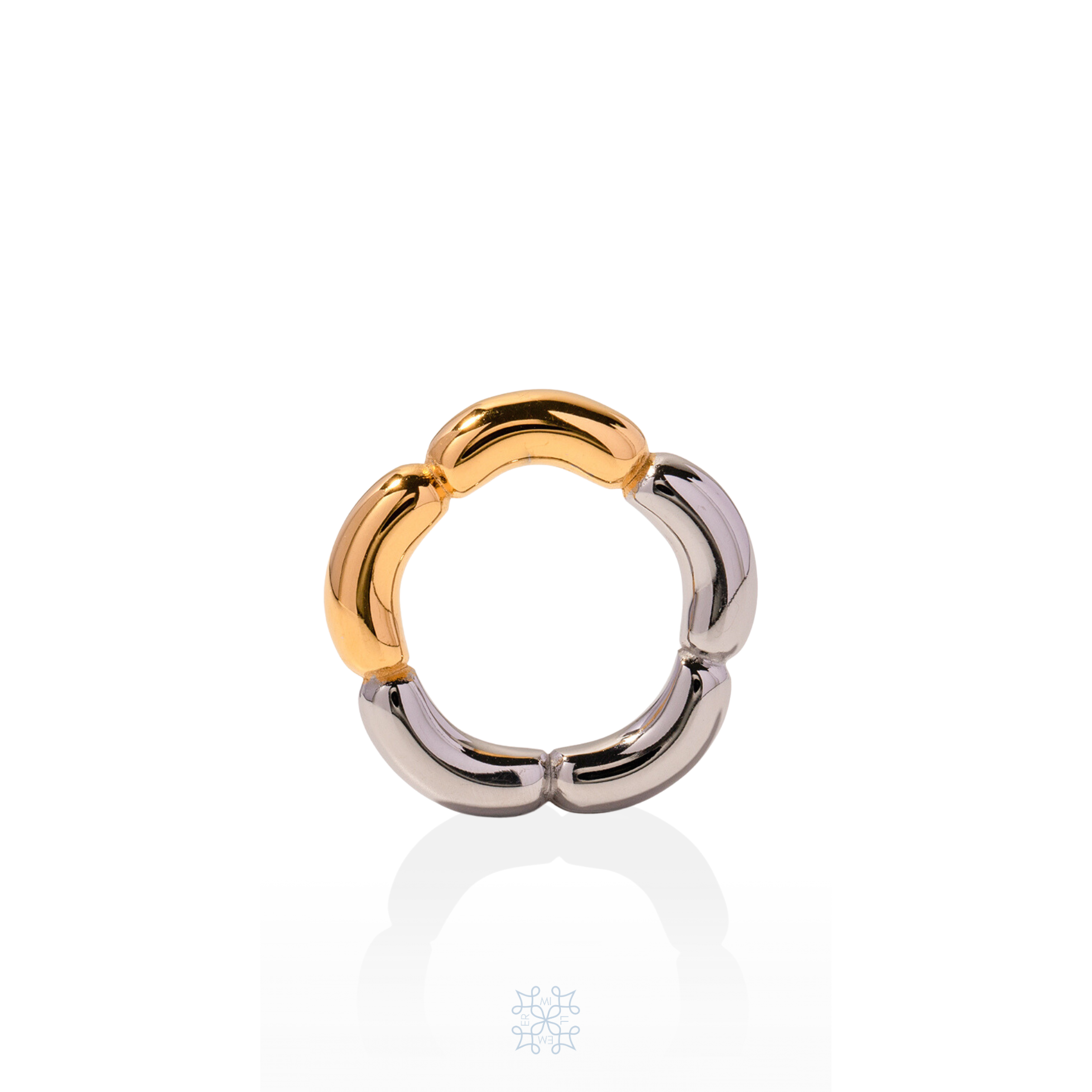 Gold and silver ring with irregular shape creating the form of a flower. mixed metal HULA ring