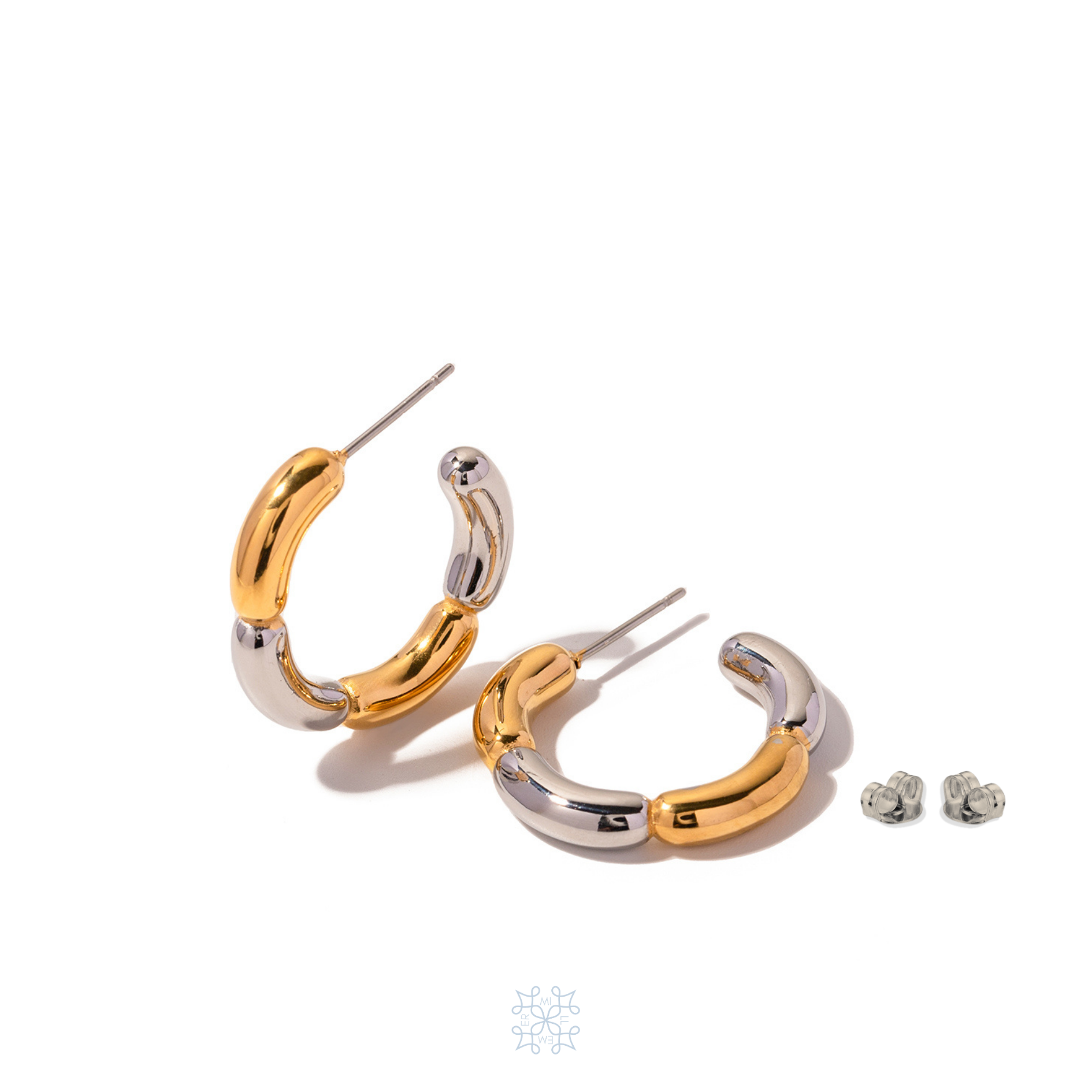 Gold and Silver Hoop earrings divided on chunky segments plated in gold and silver creating a flower shape.