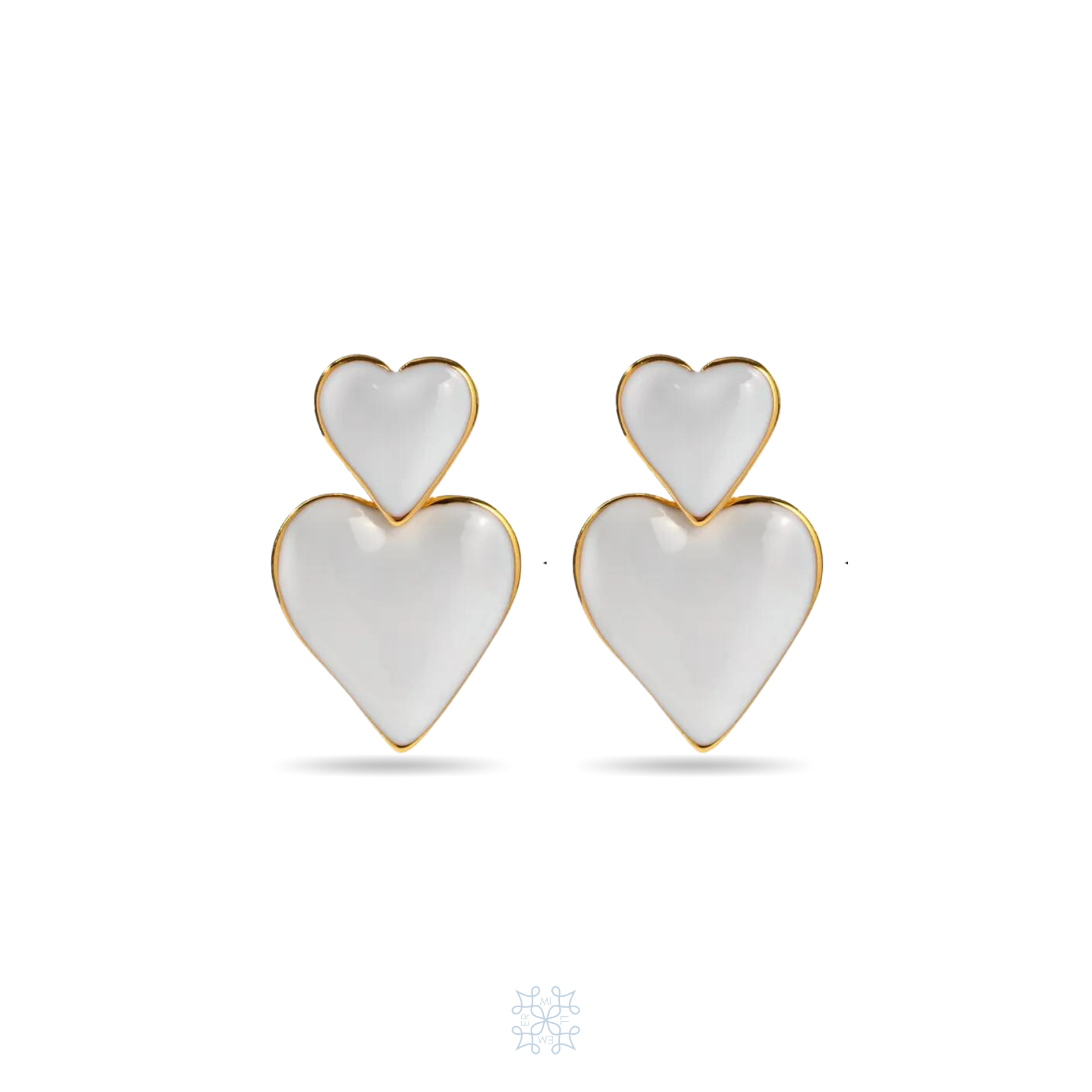 Heart shaped gold earrings. Painted in heart enamel. Two heart attached as adrop earring. Small heart at the top and the bigger heart at the bottom.
