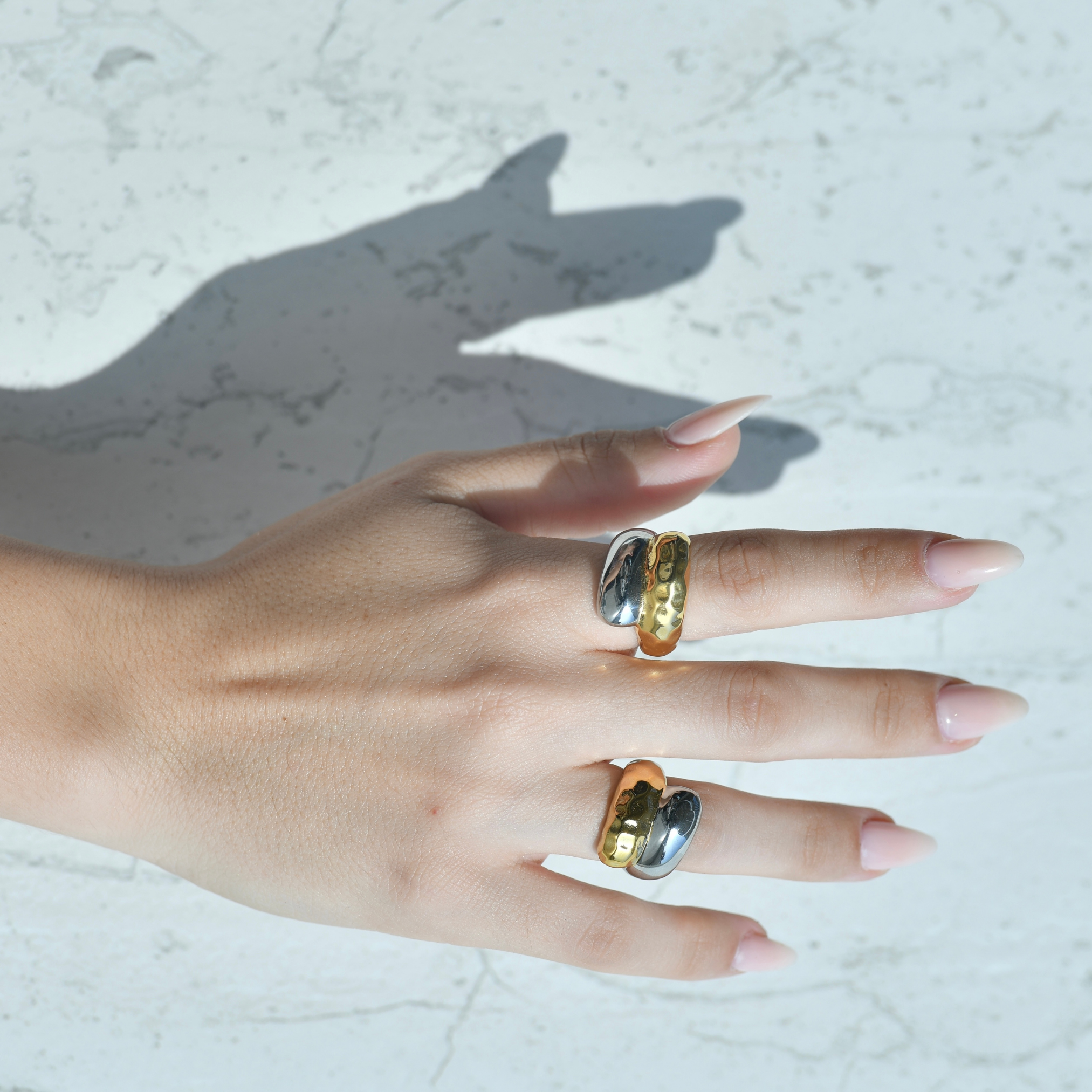  Indian Gold and silver chunky ring with irregular texture.
