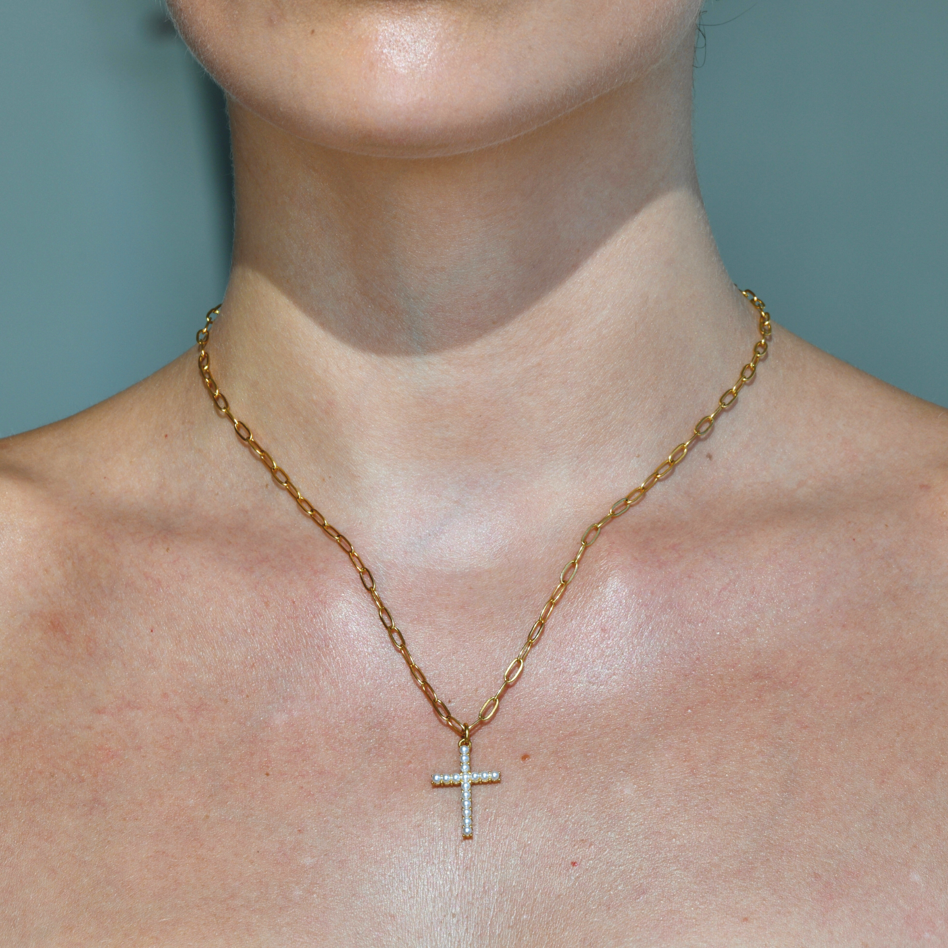 Paperclip gold chain. Gold Cross pendant with small little white pearls attached in all the surface of the cross pendant. Pray pearl cross gold necklace.