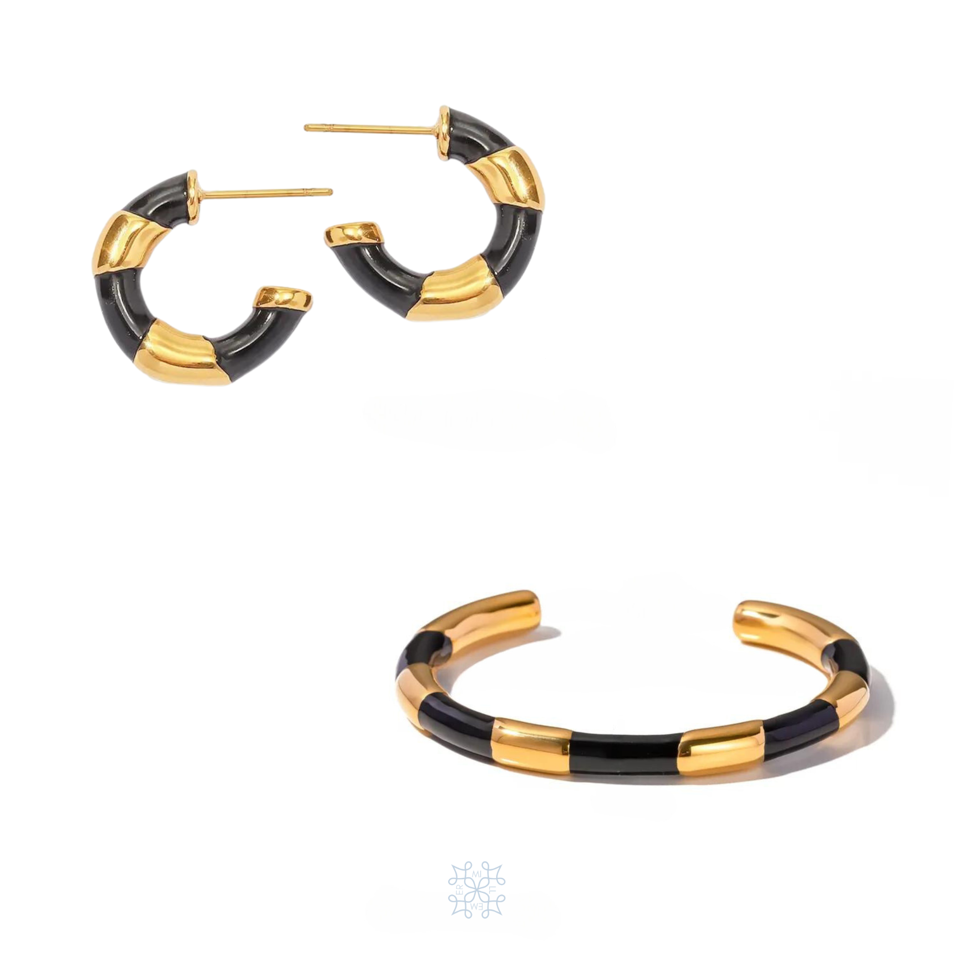 JEWELRY SET WITH PAIR OF HOOP EARRINGS AND A BANGLE BRACELET. BOTH PIECES ARE PAINTED IN BLACK ENAMEL CREATING THE SHAPE OF A RIBBON AROUND THE GOLD SURFACE.