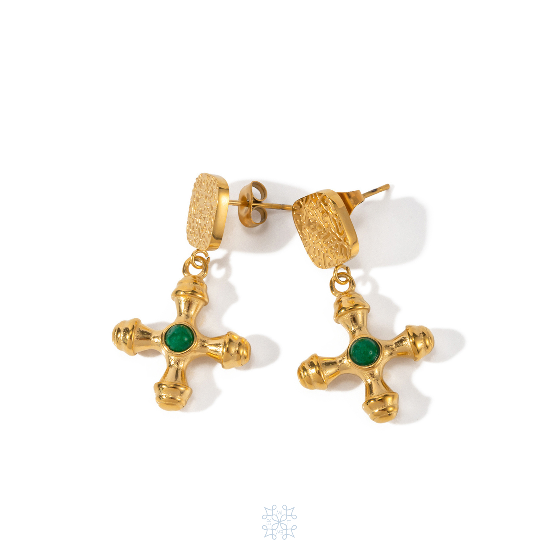 Gold  Drop pair of earrings. The stud upper part has the shape of a square with oval corners and irregular texture.The drop part has the shape of a cross with a green stone in the middle of the cross. Taormina Gold Cross Earrings