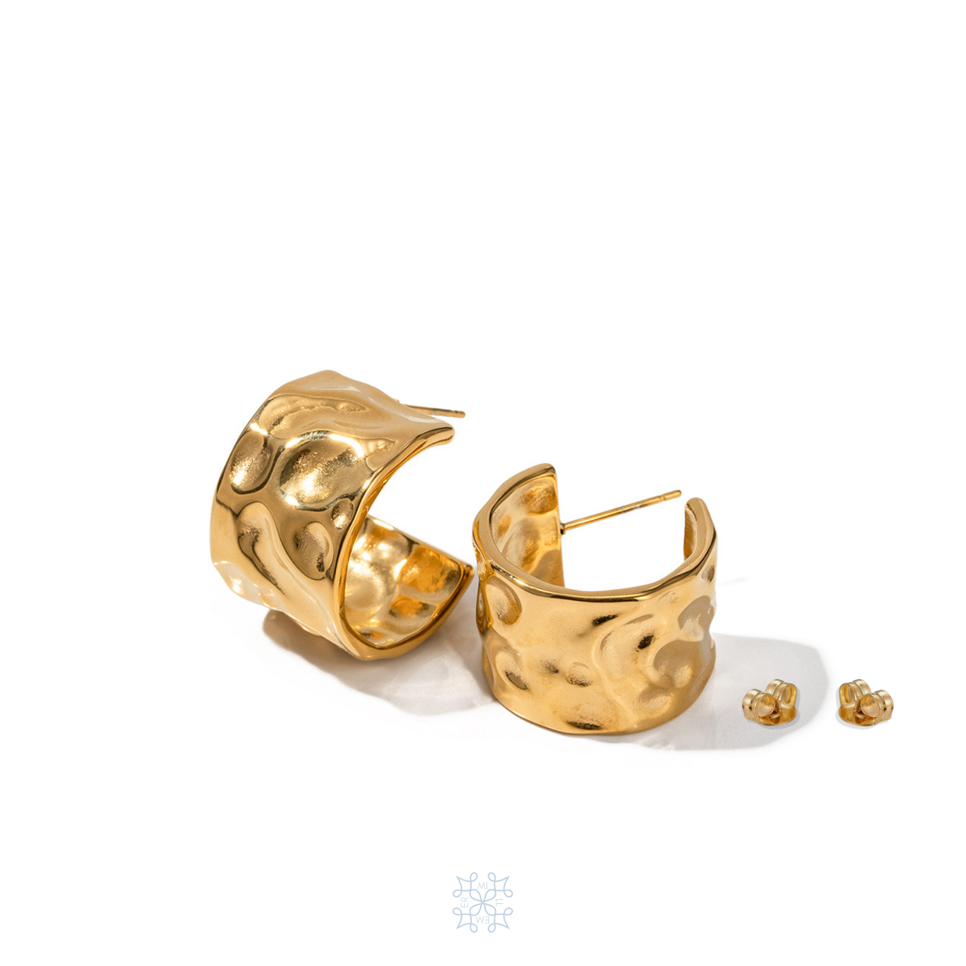 WAVE Gold Hoop Earrings with a slightly hammered surface.